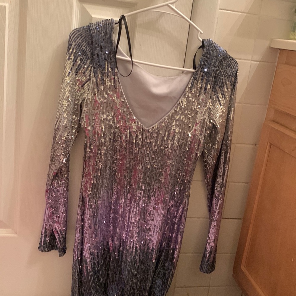So I’m selling this fancy dress.